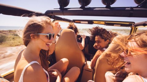 xr:d:DAE6-7f15Js:381,j:45519570670,t:23042000 Photo of four girls in a jeep with the top off