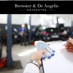 Man Assessing Car Garage