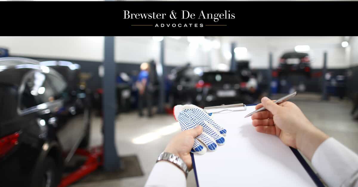 Man Assessing Car Garage