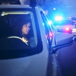 woman pulled over at night by police